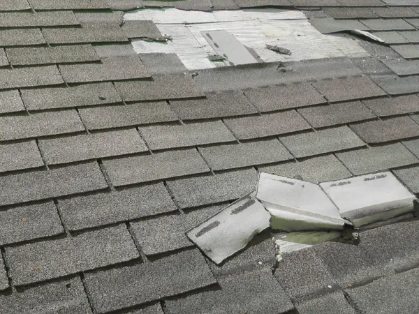 Broken roof tiles requiring repair