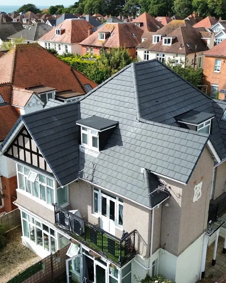 HD aerial drone view of complex tiled roof slopes and valleys