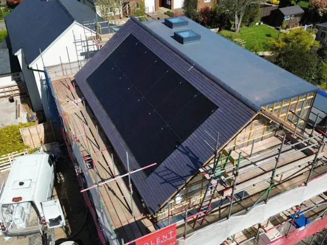 Large Solar Array on a New Build Roof Large solar panel array installed on a new build tiled roof in Bournemouth by Up Top Solar