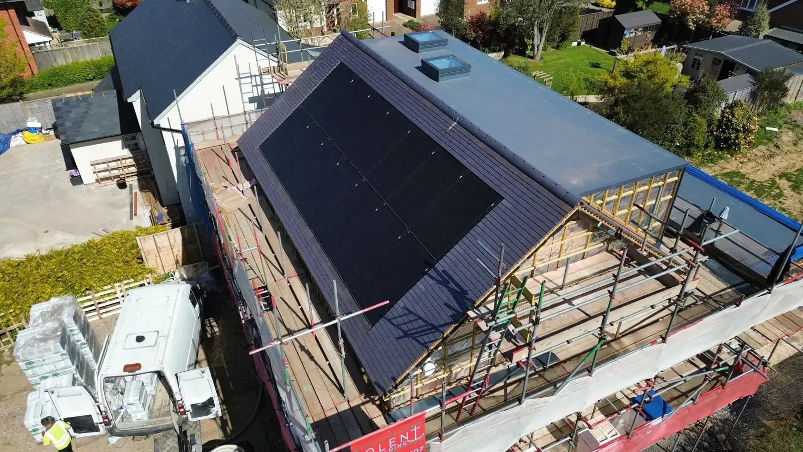 Solar panels being installed on a Dorset roof with safe access by Up Top Roofing