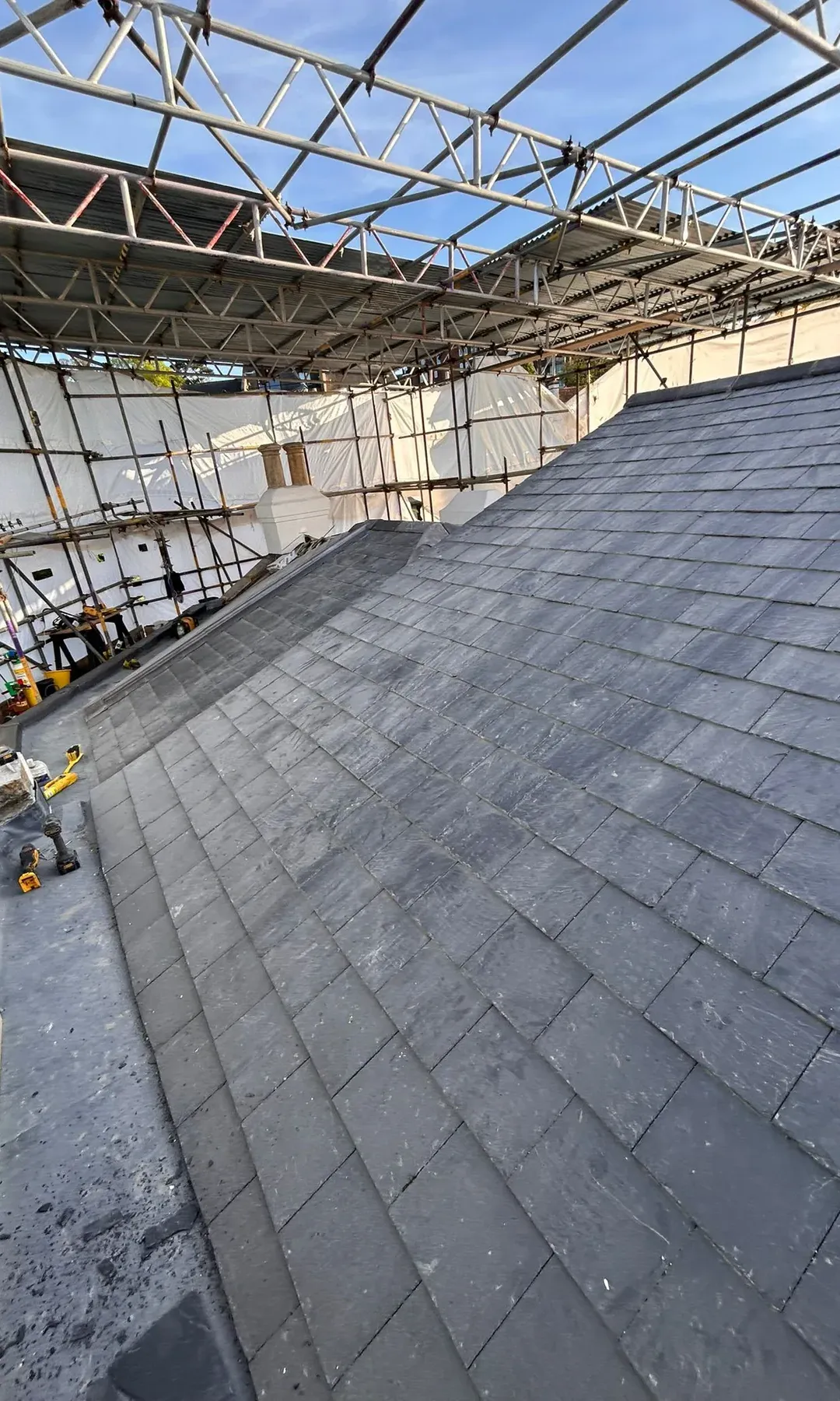 Finished natural slate pitched roof replacement in Swanage by Up Top Roofing