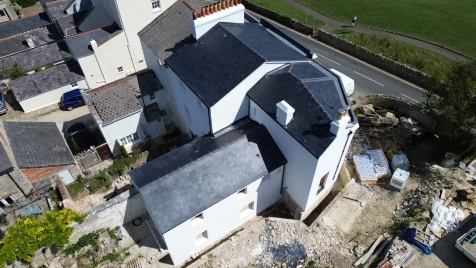 Aerial view of the Inwood Design Spanish ESCO slate roofing project in Swanage