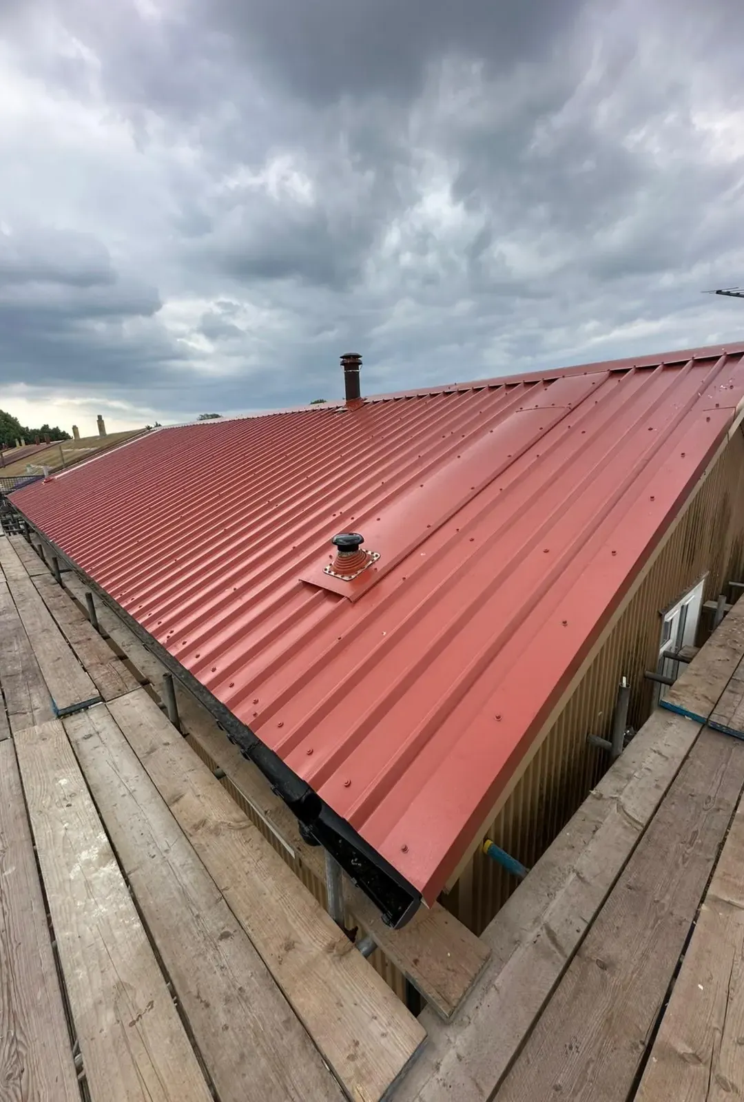 Metal profile sheet roof replacement with box guttering in Bournemouth