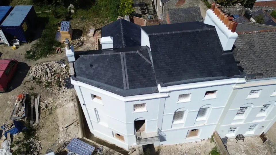 Spanish ESCO 100 natural slate roof installed by Up Top Roofing in Swanage