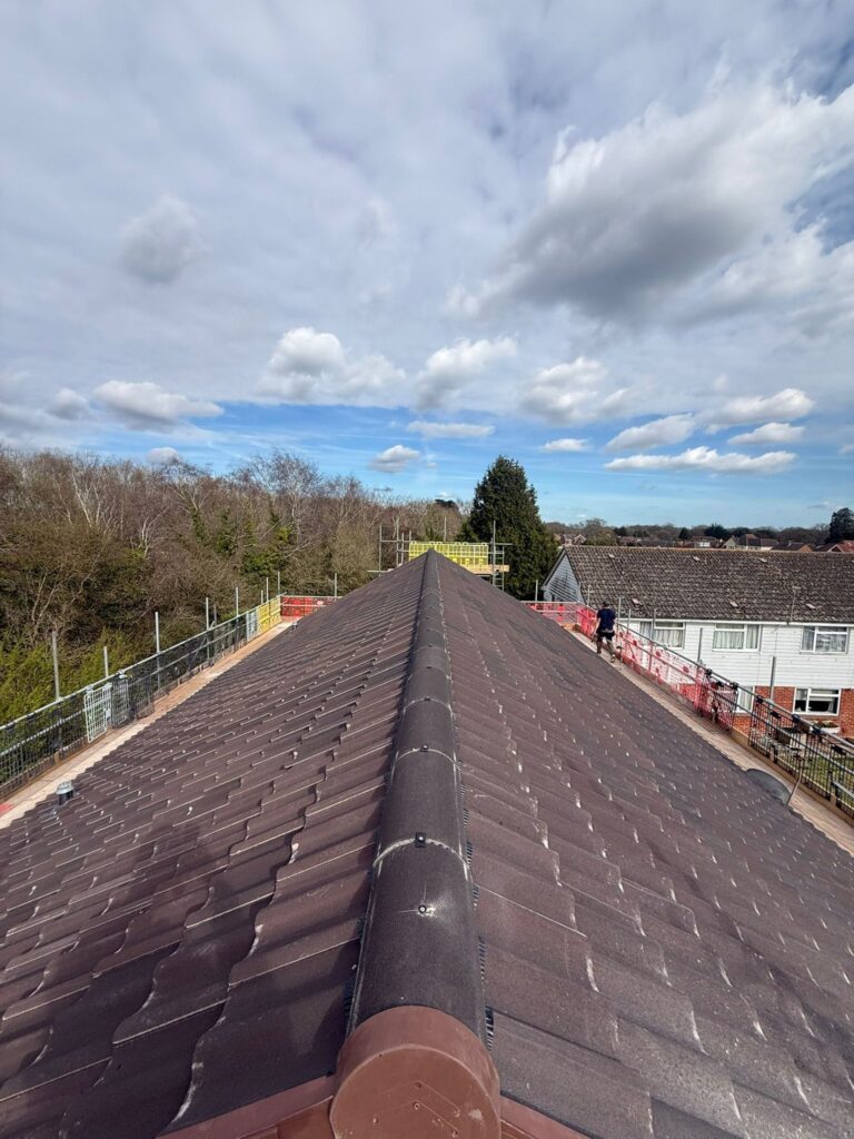 Completed ridge line with Marley Mendip tiles on a Christchurch roof replacement