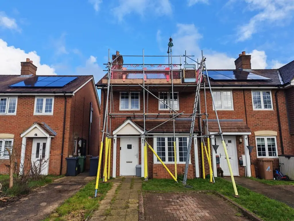 Completed solar panel installation on residential terraced houses in Dorset by Up Top Solar. Solar PV panels professionally fitted on both sides of pitched roof by qualified roofers with scaffolding by Up Top Scaffolding. Power from the top down — roofers installing solar, not electricians. Completed solar panel installation on residential terraced houses in Dorset by Up Top Solar. Solar PV panels professionally fitted on both sides of pitched roof by qualified roofers with scaffolding by Up Top Scaffolding. Power from the top down ? roofers installing solar, not electricians.